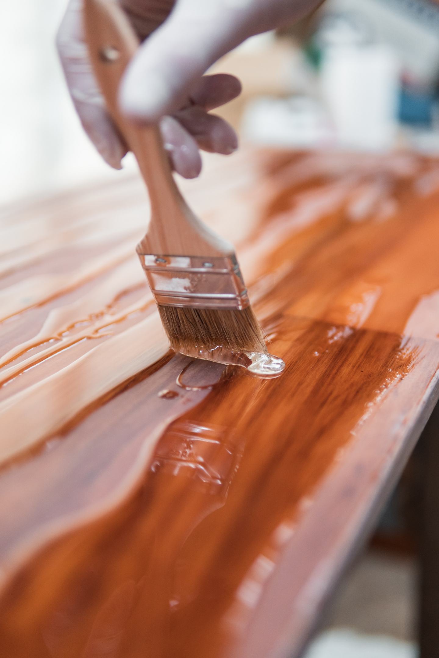 Applying protective coating to wood surface
